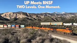 UP Manifest Meets BNSF Stack at Mormon Rocks (Drone + Tripod)