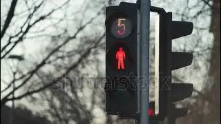 1046021779 preview Pedestrian crossing traffic light semaphore with countdown timer changing color