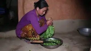 Making organic curry of green vegetables in traditional way