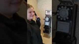 My teenage daughter trying to use a rotary phone