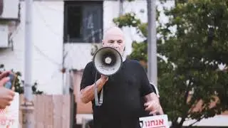 Cat activists protesting in front of a cat killer