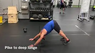 Reach | FIT Mobility Drill: Pike Stretch to Deep Lunge