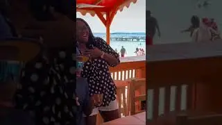Happy guests enjoying live music with island legend Sopa at Babalu&rsquo;s Bar and Grill West Bay Roatan
