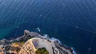 Clifftop Observation Area Offering Sweeping Vistas Of Shimmering Turquoise Ocean And Rocky