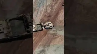 Caterpillar 637 and Caterpillar 657, scrapers grading