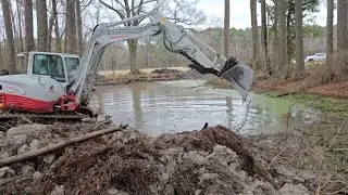 Cleaning out an old neglected farm  pond (Part 2)