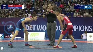 Qual. FS - 54 kg: A. OKENOV (KAZ) df. J. PIETTE WALTO (CAN) by TF, 10-0