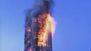 London Apartment Building Smoldering After Fire