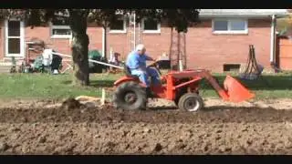Power King Tractor, 1980, Model 1618, plowing garden.