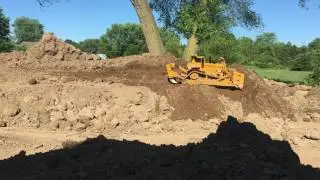 Rc bulldozer pushes and blows a hydraulic line