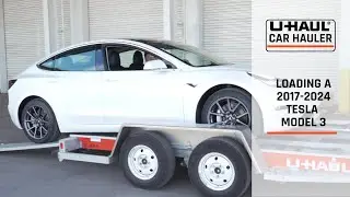 Loading a 2017-2024 Tesla Model 3 Onto a U-Haul Car Hauler