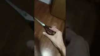 Using scissors as a butterfly knife