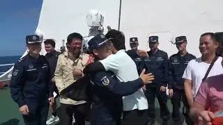 China has handed over rescued sailors to the Philippines.
