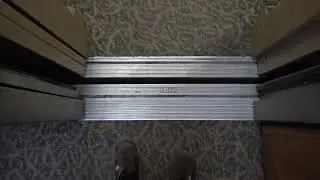 Tastefully Modernized Otis Series 2 Hydraulic Elevators at 900 Executive Plaza in Mobile, AL.
