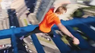 Daredevil Performs Insane Tricks on Building Ledge