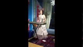 Julie Feeney sings Mr. Roving Eye Guy solo in her 'pages' dress in Washington