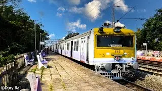Little different color beautiful EMU passenger train of SER crossing with Express & Freight train