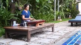 Hammer head dulcimer Music by the pool Banthai Village Chiang Mai