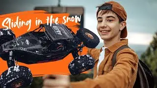 RC buggy sliding in the snow
