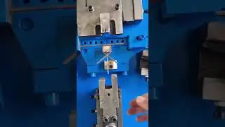 Automatic strapping buckle making machine