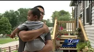 Dad saves son from moving car