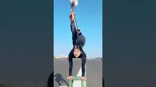 Unbelievable Trick Shot with Her Feet! 🎯🔥 #TrickShot #UnbelievableSkills #ViralShorts #BuzzypopKinds