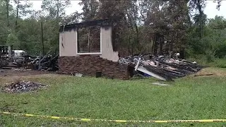 Candle starts fire that kills woman and child