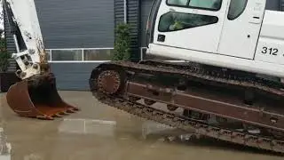 Caterpillar 320BL running @ sp2000