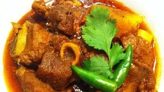 Cooking Indian Mutton Kulambu Using a Traditional Meat Tenderizer