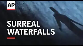Dubai Expo installation bathes visitors in surreal waterfalls