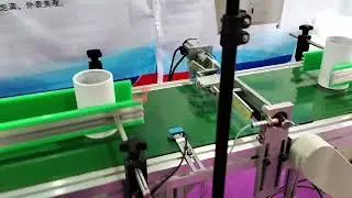 Paper tube labeling, edge rounding and bottom inserting machine