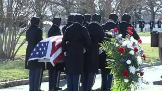 A unique shot of the casket being removed from the caisson.