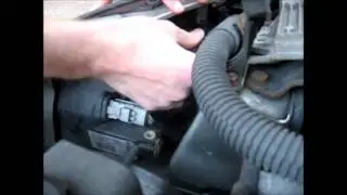How to change the headlight bulbs on a Peugeot (shown on a Peugeot 206)