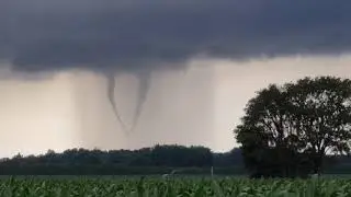 Twin Funnel Clouds Briefly Intertwine in Ontario Sky