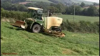 Mowing Grass for Silage with Krone BigM.  Some cultivations as well.