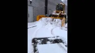 Sectional snow plow