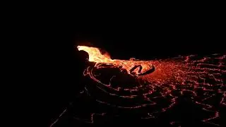 Early morning view of lava flowing into Halema&lsquo;uma&lsquo;u crater