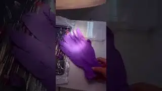 Cute girl wearing purple gloves