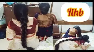 Two beautiful long hair women hair play during night time before sleep