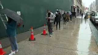 People line up for Covid-19 testing in New York as infections rise | AFP