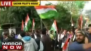 Congress workers celebrate victory outside Sachin Pilot's residence