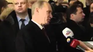 Vladimir Putin and his wife Lyudmila vote at in the Russian presidential elections