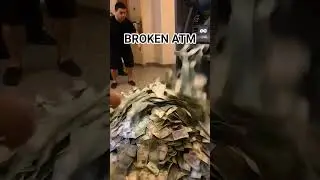 Money poured out of ATM machine somewhere in...