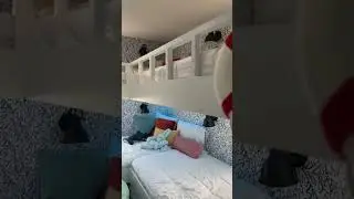 Reef wallpaper, giant connect four, a projector & screen, custom built bunk beds, LED strip lights t