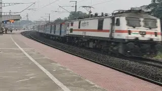 Speedy train neglecting sharp curve..Eastern Railway King in his beast mode..