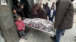 Palestinians Mourn Victims of Building Collapse in Gaza City - 01/13/2026