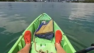 Kayak crossing the boat channel in Rickenbacker Breach -Key Biscayne