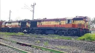 High speed Twin Alco leading BCNHL Wagon rake & WDG4 with large BCN rake.