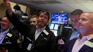 Wall Street sinks as Powell's speech spooks investors