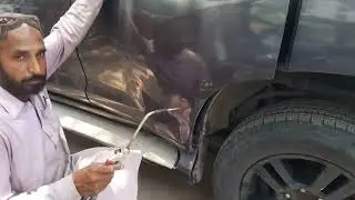 Toyota TX door dry denting Javed auto workshop g10 Islamabad Pakistan 00923335552761